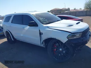 2021 Dodge Durango SRT Hellcat with VIN 1C4SDJH96MC692601, listed as a IAAI auction lot 41764490 with 27,434 mi miles and . Bid and sale history available at DreamBid. Image 18.