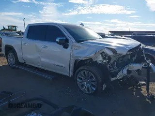 2021 GMC Sierra 1500 Denali z VIN 3GTU9FETXMG200947, wystawiony jako IAAI lot #41322825 z przebiegiem Nie podano mil oraz . Historia ofert i sprzedaży dostępna na DreamBid. Obrazek 1.