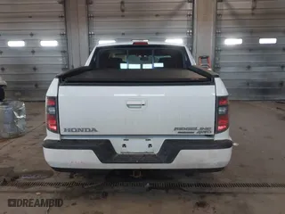 2014 Honda Ridgeline SE with VIN 5FPYK1F6XEB010582, listed as a IAAI auction lot 41641803 with 69,923 mi miles. Bid and sale history available at carsss.com. Image 16.