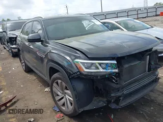 2021 Volkswagen Atlas SE z VIN 1V2JE2CA7MC204478, wystawiony jako IAAI lot #41942167 z przebiegiem 90 151 mil mil oraz . Historia ofert i sprzedaży dostępna na DreamBid. Obrazek 1.