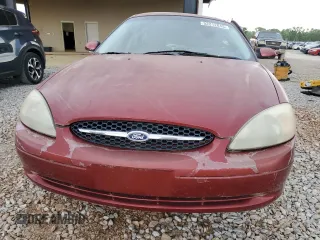 2000 Ford Taurus SES with VIN 1FAFP55U1YA262488, listed as a Copart auction lot 52312645 with 128,621 mi miles and Salvage Title. Bid and sale history available at DreamBid. Image 5.