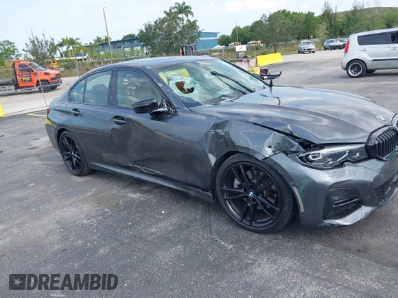 2022 BMW 3 Series 330i with VIN 3MW5R1J0XN8C41168, listed as a IAAI auction lot 42322526 with 44,889 mi miles and . Bid and sale history available at DreamBid. Image 6.