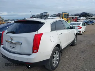2010 Cadillac SRX Luxury Collection with VIN 3GYFNDEY6AS562281, listed as a IAAI auction lot 41362656 with 123,661 mi miles. Bid and sale history available at carsss.com. Image 4.