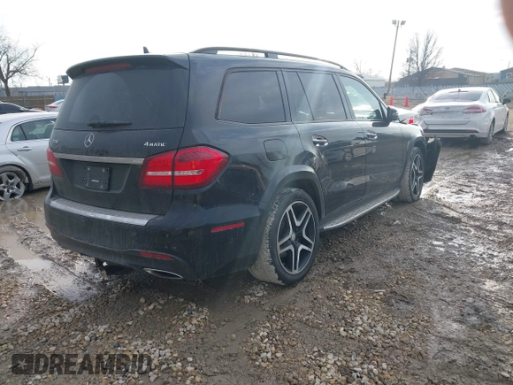 2017 Mercedes-Benz GLS 550 z VIN 4JGDF7DE8HA788641, wystawiony jako IAAI lot #41664587 z przebiegiem 156 707 mil mil oraz . Historia ofert i sprzedaży dostępna na DreamBid. Obrazek 4.