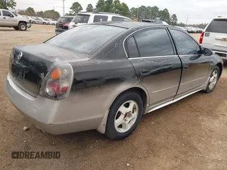 2002 Nissan Altima SE with VIN 1N4BL11D52C260747, listed as a IAAI auction lot 41733376 with 151,750 mi miles. Bid and sale history available at carsss.com. Image 4.