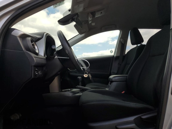 2018 Toyota RAV4 LE with VIN 2T3BFREV8JW788362, listed as a Copart auction lot 64053735 with 124,668 mi miles and Salvage title. Bid and sale history available at DreamBid. Image 7.