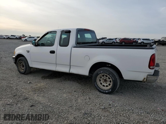 1998 Ford F-150 with VIN 1FTZX17W2WKB25677, listed as a Copart auction lot 54419145 with 319,584 mi miles and Salvage title. Bid and sale history available at DreamBid. Image 2.