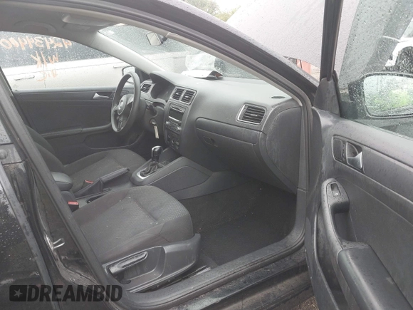 2014 Volkswagen Jetta S with VIN 3VW2K7AJ7EM435702, listed as a IAAI auction lot 42434400 with 117,953 mi miles and . Bid and sale history available at DreamBid. Image 5.
