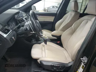 2018 BMW X1 xDrive28i with VIN WBXHT3C37J5K24407, listed as a Copart auction lot 51760805 with 49,311 mi miles and Salvage Title. Bid and sale history available at carsss.com. Image 7.