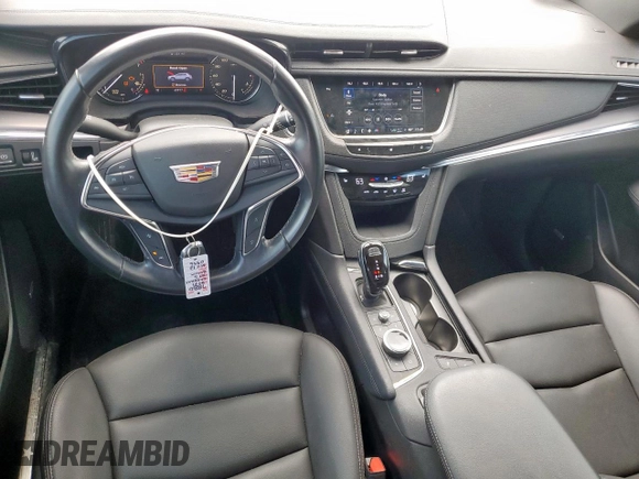 2021 Cadillac XT5 FWD Luxury with VIN 1GYKNAR42MZ120996, listed as a Copart auction lot 63314655 with 49,977 mi miles and Salvage title. Bid and sale history available at DreamBid. Image 8.