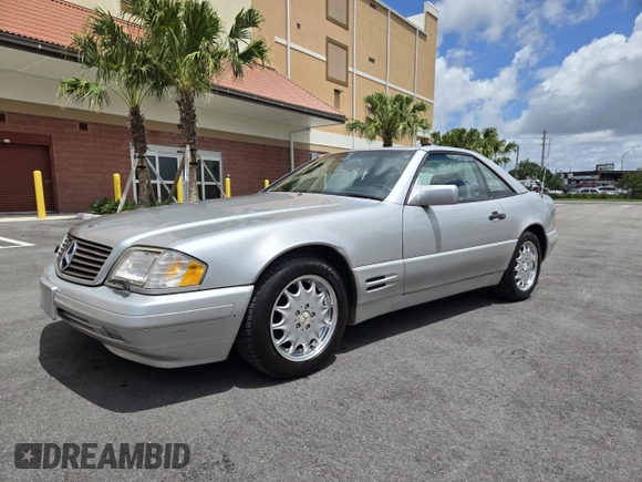 1996 Mercedes-Benz SL 320 with VIN WDBFA63F4TF138117, listed as a Copart auction lot 63440965 with 56,621 mi miles and Clean title. Bid and sale history available at DreamBid. Image 2.