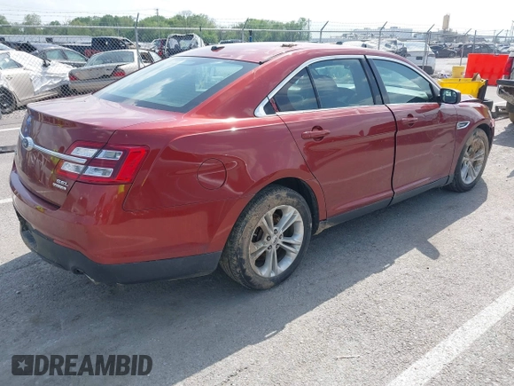 2014 Ford Taurus SEL z VIN 1FAHP2E82EG157445, wystawiony jako IAAI lot #42133676 z przebiegiem 174 616 mil mil oraz . Historia ofert i sprzedaży dostępna na DreamBid. Obrazek 4.