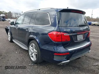 2014 Mercedes-Benz GL-Class GL 550 with VIN 4JGDF7DE2EA313661, listed as a IAAI auction lot 41214931 with 102,469 mi miles. Bid and sale history available at carsss.com. Image 3.