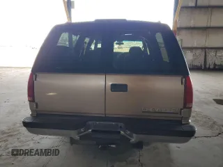 1999 Chevrolet Suburban with VIN 3GNEC16R3XG249107, listed as a Copart auction lot 46469765 with 165,376 mi miles and Clean Title. Bid and sale history available at carsss.com. Image 6.