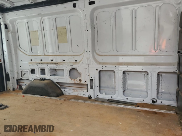 2017 Ford Transit z VIN 1FTYR2CM1HKB02605, wystawiony jako Copart lot #59355545 z przebiegiem Nie podano mil oraz Szkoda całkowita • Salvage title. Historia ofert i sprzedaży dostępna na DreamBid. Obrazek 11.