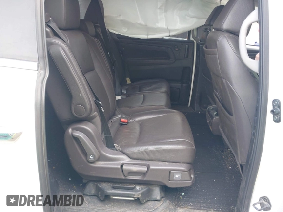 2018 Honda Odyssey Touring with VIN 5FNRL6H81JB023530, listed as a IAAI auction lot 42040124 with 109,128 mi miles and . Bid and sale history available at DreamBid. Image 8.