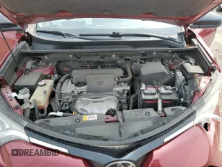2018 Toyota RAV4 LE with VIN JTMBFREV2JD233808, listed as a Copart auction lot 59021235 with 71,430 mi miles and Salvage title. Bid and sale history available at DreamBid. Image 12.