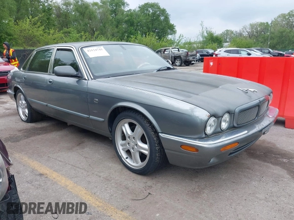 2002 Jaguar XJ with VIN SAJDA12CX2LF49531, listed as a IAAI auction lot 42124743 with 120,486 mi miles. Bid and sale history available at carsss.com. Image 1.