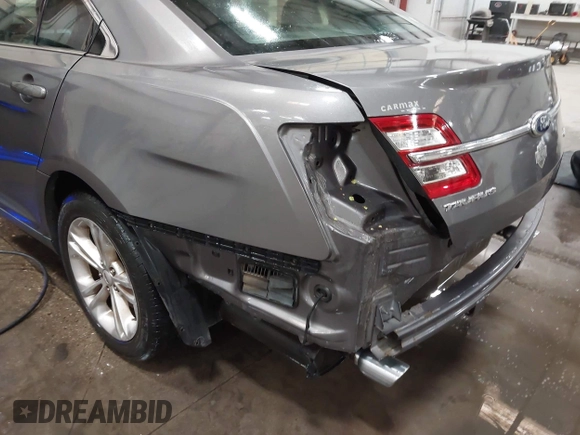 2013 Ford Taurus SEL with VIN 1FAHP2E86DG177504, listed as a IAAI auction lot 42071852 with 130,547 mi miles and . Bid and sale history available at carsss.com. Image 13.