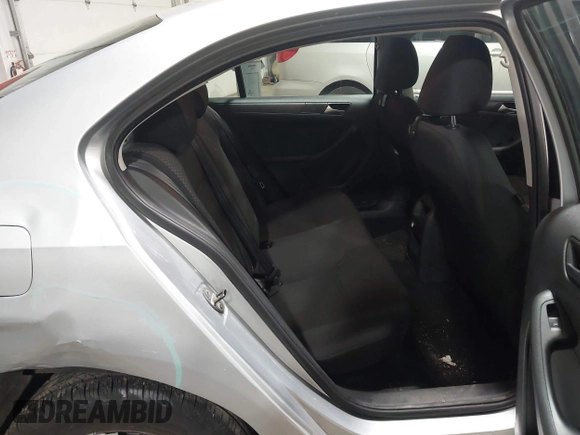 2014 Volkswagen Jetta S z VIN 3VW2K7AJXEM208116, wystawiony jako IAAI lot #42076606 z przebiegiem 118 917 mil mil oraz . Historia ofert i sprzedaży dostępna na DreamBid. Obrazek 8.