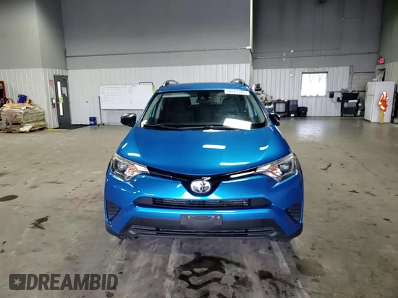 2017 Toyota RAV4 LE with VIN JTMBFREV8HJ141257, listed as a Copart auction lot 54527785 with 125,423 mi miles and Salvage Title. Bid and sale history available at DreamBid. Image 15.