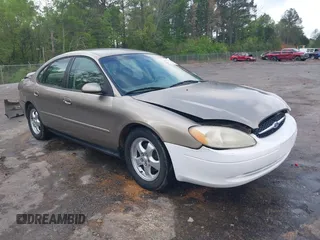 2003 Ford Taurus SE Standard with VIN 1FAFP53U63G125751, listed as a IAAI auction lot 41933803 with 196,710 mi miles. Bid and sale history available at carsss.com. Image 1.