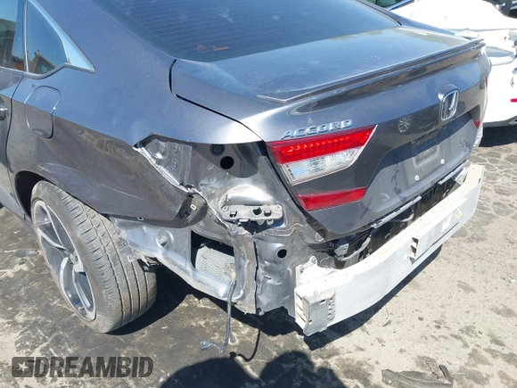2020 Honda Accord Sport z VIN 1HGCV2F32LA020830, wystawiony jako IAAI lot #42048772 z przebiegiem 84 294 mil mil oraz . Historia ofert i sprzedaży dostępna na DreamBid. Obrazek 18.