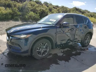 2020 Mazda CX-5 Touring z VIN JM3KFBCM2L0834624, wystawiony jako Copart lot #57001005 z przebiegiem 52 999 mil mil oraz Szkoda całkowita • Salvage title. Historia ofert i sprzedaży dostępna na DreamBid. Obrazek 1.
