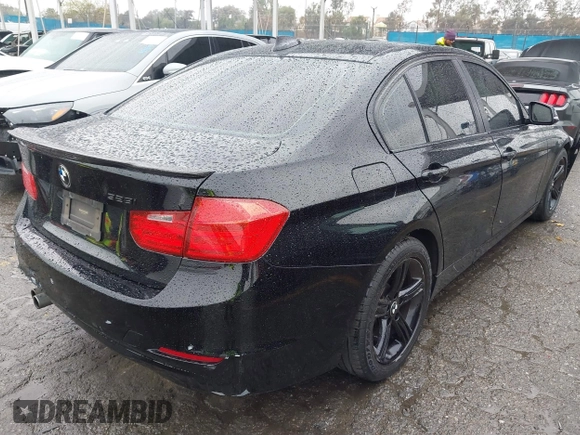 2015 BMW 3 Series 328i with VIN WBA3A5C59FF606236, listed as a IAAI auction lot 41690502 with 115,085 mi miles. Bid and sale history available at carsss.com. Image 4.