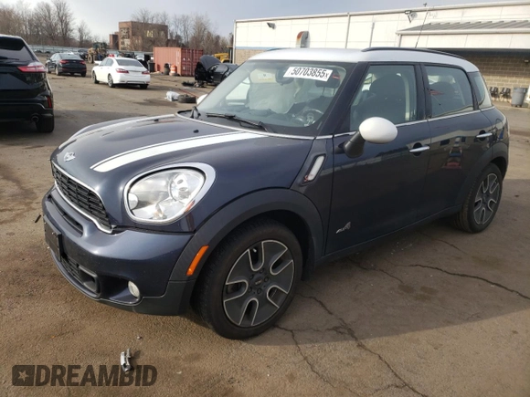 2012 MINI Countryman S with VIN WMWZC5C55CWL64092, listed as a Copart auction lot 50703855 with 69,785 mi miles and Salvage Title. Bid and sale history available at DreamBid. Image 1.