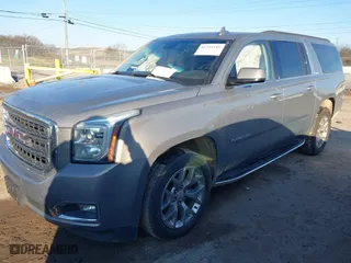 2019 GMC Yukon XL SLT with VIN 1GKS2GKC0KR137672, listed as a IAAI auction lot 41293745 with 104,141 mi miles. Bid and sale history available at carsss.com. Image 18.