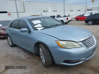2014 Chrysler 200 Touring with VIN 1C3CCBBB3EN136829, listed as a IAAI auction lot 41279121 with 122,947 mi miles. Bid and sale history available at carsss.com. Image 1.