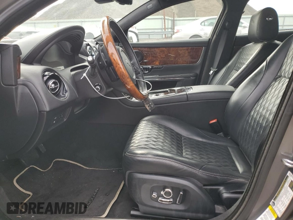 2018 Jaguar XJ Portfolio with VIN SAJWJ2GD1J8W15611, listed as a Copart auction lot 44835764 with 60,010 mi miles and . Bid and sale history available at DreamBid. Image 7.
