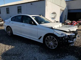 2019 BMW 5 Series 540i xDrive with VIN WBAJE7C59KWW14855, listed as a Copart auction lot 49840104 with 61,705 mi miles and Salvage title. Bid and sale history available at DreamBid. Image 4.