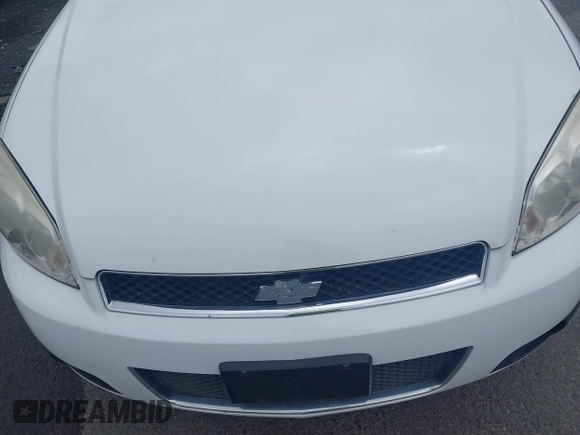 2014 Chevrolet Impala Police Police z VIN 2G1WD5E37E1129114, wystawiony jako IAAI lot #42275018 z przebiegiem 109 297 mil mil oraz . Historia ofert i sprzedaży dostępna na DreamBid. Obrazek 6.