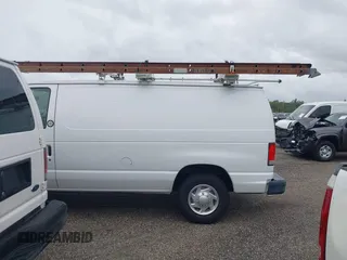 2014 Ford Econoline Cargo Commercial z VIN 1FTNE2ELXEDA12338, wystawiony jako IAAI lot #42119983 z przebiegiem 99 394 mil mil oraz . Historia ofert i sprzedaży dostępna na DreamBid. Obrazek 14.
