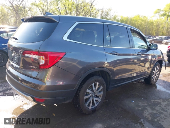 2019 Honda Pilot EX-L with VIN 5FNYF6H54KB038176, listed as a IAAI auction lot 42039560 with 52,404 mi miles and . Bid and sale history available at carsss.com. Image 4.