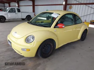 2003 Volkswagen New Beetle Coupe GL with VIN 3VWBK21C23M407145, listed as a IAAI auction lot 41934974 with 157,422 mi miles. Bid and sale history available at carsss.com. Image 2.
