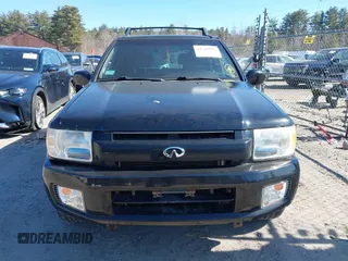 2002 Infiniti QX4 Luxury z VIN JNRDR09Y12W261007, wystawiony jako IAAI lot #41741097 z przebiegiem 114 945 mil mil oraz . Historia ofert i sprzedaży dostępna na DreamBid. Obrazek 6.
