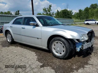 2010 Chrysler 300 with VIN 2C3CA6CTXAH141422, listed as a Copart auction lot 66947424 with 140,585 mi miles and Clean Title. Bid and sale history available at carsss.com. Image 4.