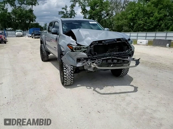 2020 Toyota Tacoma SR5 z VIN 3TMAZ5CN0LM115004, wystawiony jako Copart lot #55343295 z przebiegiem 82 865 mil mil oraz Nie do naprawy • Non repairable. Historia ofert i sprzedaży dostępna na DreamBid. Obrazek 14.