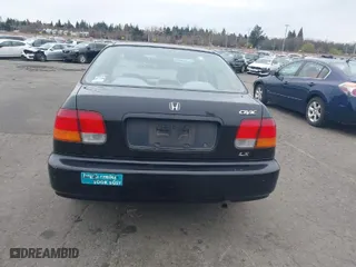 1998 Honda Civic LX with VIN JHMEJ6675WS002154, listed as a IAAI auction lot 41836717 with 150,025 mi miles. Bid and sale history available at carsss.com. Image 16.