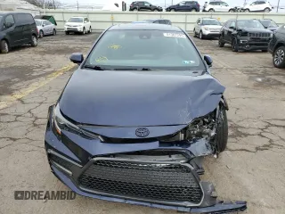2022 Toyota Corolla SE with VIN 5YFP4MCE9NP101844, listed as a Copart auction lot 51387295 with 118,541 mi miles and Salvage Title. Bid and sale history available at carsss.com. Image 5.