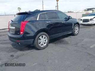 2014 Cadillac SRX Luxury Collection z VIN 3GYFNEE30ES650372, wystawiony jako IAAI lot #42195783 z przebiegiem 169 113 mil mil oraz . Historia ofert i sprzedaży dostępna na DreamBid. Obrazek 4.