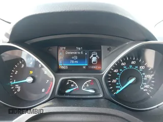 2015 Ford Escape Titanium z VIN 1FMCU0J91FUC41531, wystawiony jako IAAI lot #41903203 z przebiegiem 118 962 mil mil oraz . Historia ofert i sprzedaży dostępna na DreamBid. Obrazek 7.
