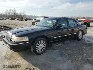 2011 Mercury Grand Marquis LS with VIN 2MEBM7FV0BX608564, listed as a Copart auction lot 48513095 with 128,241 mi miles and Salvage Title. Bid and sale history available at carsss.com. Image 1.