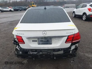 2014 Mercedes-Benz E 550 Sport with VIN WDDHF9BBXEA940995, listed as a IAAI auction lot 41872452 with 50,451 mi miles and . Bid and sale history available at DreamBid. Image 17.