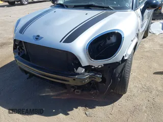 2012 MINI Countryman S with VIN WMWZC5C59CWL60076, listed as a IAAI auction lot 42078926 with 60,280 mi miles and . Bid and sale history available at DreamBid. Image 6.