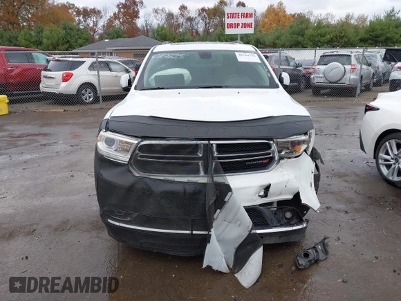 2015 Dodge Durango SXT with VIN 1C4RDJAG8FC239977, listed as a IAAI auction lot 40764725 with 133,809 mi miles and . Bid and sale history available at carsss.com. Image 13.