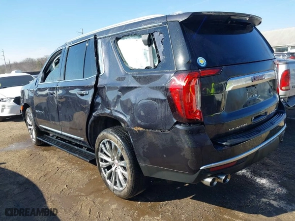 2023 GMC Yukon Denali with VIN 1GKS2DKL4PR460595, listed as a IAAI auction lot 41662354 with 21735 miles. Bid and sale history available at carsss.com. Image 3.